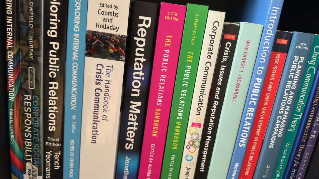 Public Relations books on a shelf